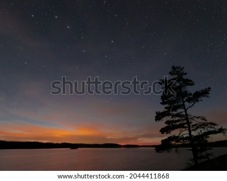 Big dipper in the night sky over a lake in western Sweden Royalty-Free Stock Photo #2044411868