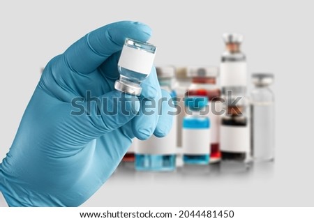 The nurse holding Covid19 vaccine in hand