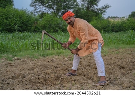 Farmer is doing cultivation in his field