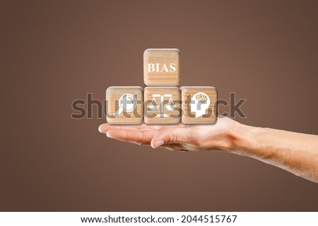 Personal opinions prejudice bias. Concept of facts and biases on wooden desk. Royalty-Free Stock Photo #2044515767