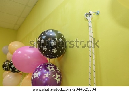 Inflatable party balloons in the room. Celebration of the solemn date.