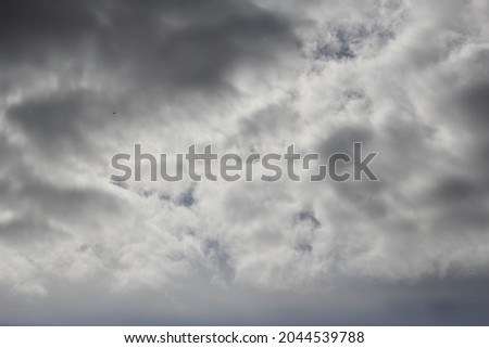 Background of large white clouds on a blue sky background