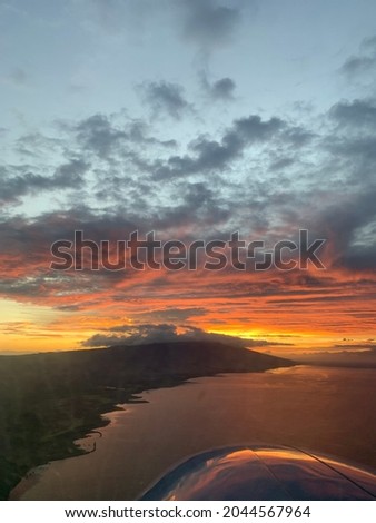 Hawaii morning sunrise from airplane