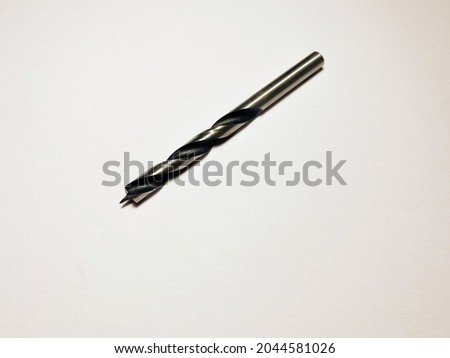8 mm wood drill bit for a screwdriver or drill on a white insulated background