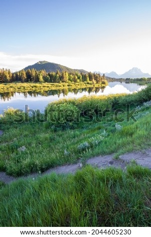 Beautiful evening sunset at Oxbow bend overview snake river, Grand Teton National Park during summer.