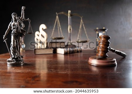 Law and justice symbols on lawyer desk. 