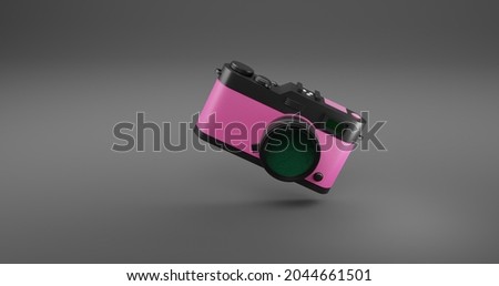 AN OBJECT OF A 3D CAMERA THAT HAS A SMALL SIZE, BECAUSE THIS IS A MIRRORLESS CAMERA. THIS 3D CAMERA IS IN BLACK AND pink AND MIXED WITH A grey BACKGROUND TO LOOK BEAUTIFUL AND CUTE