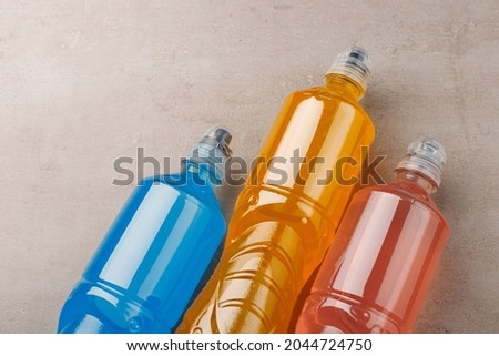 Isotonic sports drink in bottle, energy beverage  Royalty-Free Stock Photo #2044724750