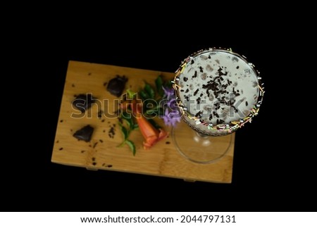 Alcholic Coctail pictures on beach and black background