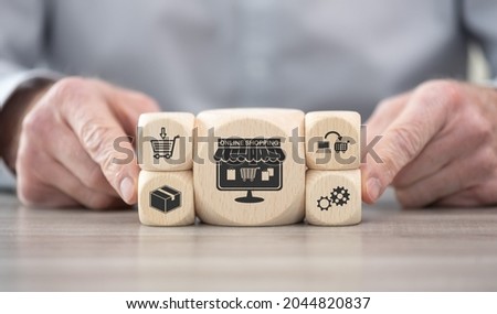 Wooden blocks with symbol of online shopping concept