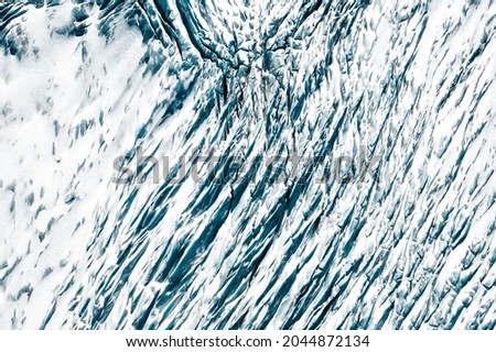 Abstract background of snow and ice texture from ice cave in winter Iceland