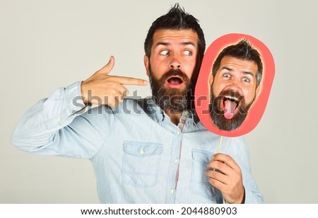 Surprised Man with nameplate with face. Barber fashion and beauty. Feeling and emotions. Face expression.