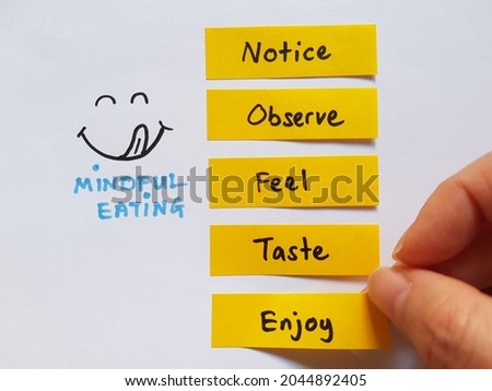 Mindful eating concept. Mindfulness lifestyle. Tips for mindful eating, notice, observe, feel, taste and enjoy food Royalty-Free Stock Photo #2044892405
