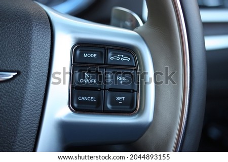Radar-guided cruise controls in a modern luxury vehicle