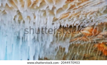 Blur picture background of ice on the cave's ceiling during winter time of Russia,  Europe. 