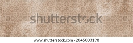 Old brown orange white rusty vintage shabby patchwork motif tiles stone concrete cement wall texture background banner Royalty-Free Stock Photo #2045003198