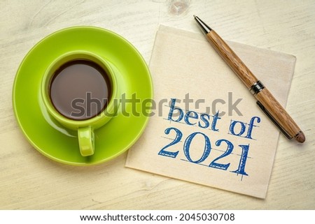 best of 2021 -  handwriting on a napkin with a cup of coffee, product or business review of the recent year Royalty-Free Stock Photo #2045030708
