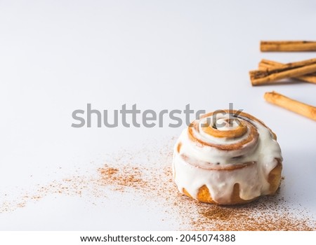 Cinnamon roll on white background Royalty-Free Stock Photo #2045074388