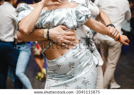 Kharkiv, Ukraine 17.08.21 People dancing bachata on the dance floor Royalty-Free Stock Photo #2045115875