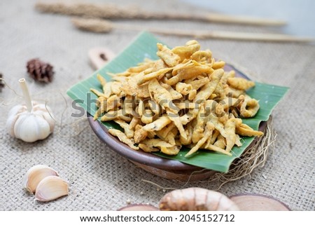 Wader fish that is processed into crispy and healthy chips is perfect for everyday snacks Royalty-Free Stock Photo #2045152712