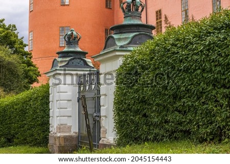 Beautiful exterior view of old entrance gate of Renaissance castle-residence in Uppsala.