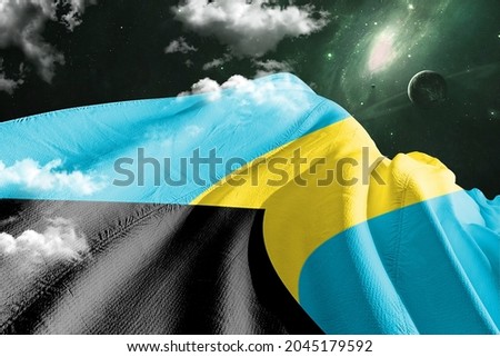 Bahamas national flag cloth fabric waving on beautiful sky.