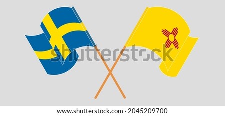 Crossed and waving flags of Sweden and the State of New Mexico