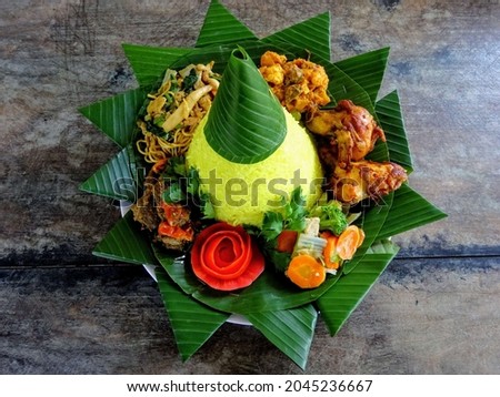 Tumpeng traditional Indonesian food used during certain ceremonies Royalty-Free Stock Photo #2045236667