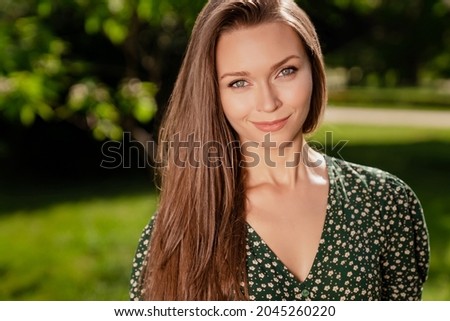 Photo of stunning happy cheerful woman summer enjoy weekend vacation in urban outdoors outside park