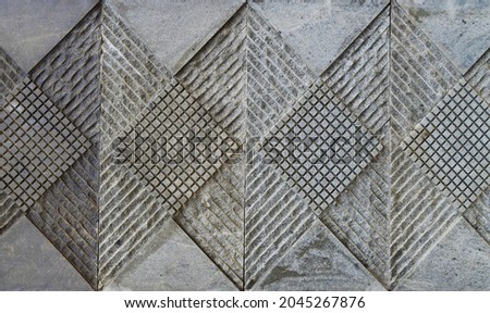 Abstract geometric brick wall stone decoration carving
