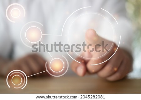 Man touching empty flow chart on the virtual screen, business process or goal concept, clicking empty circle flowchart