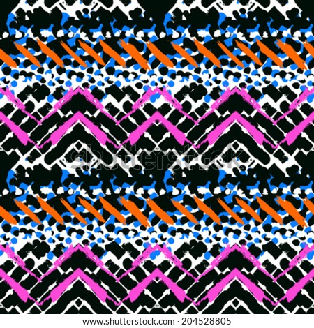 Striped hand painted vector seamless pattern with ethnic and tribal motifs, zigzag lines and brushstrokes in multiple bright colors for summer fall fashion