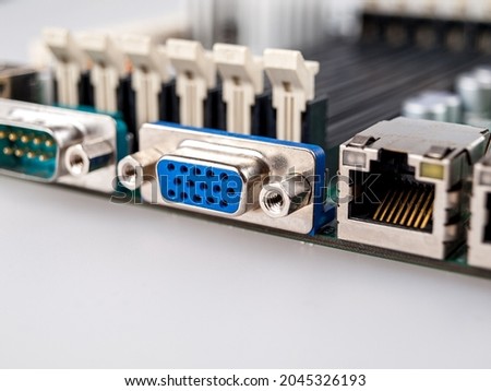Connector on the computer motherboard for connecting the video cable, connecting the display, vga analog connector, close-up Royalty-Free Stock Photo #2045326193