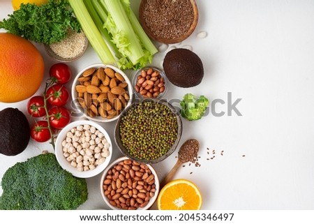 Overhead view of vegetables and grains celery copy space food