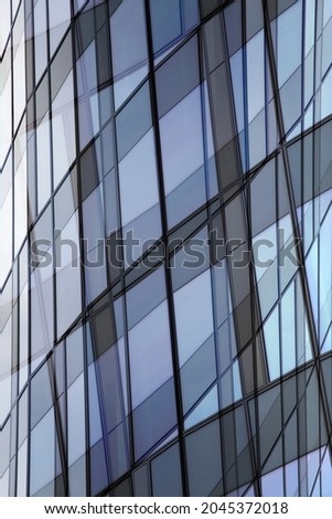 Double exposure photo of windows resembling futuristic built structure with glass walls. Abstract modern architecture background in minimalism style. Hi-tech building exterior. Polygonal pattern.