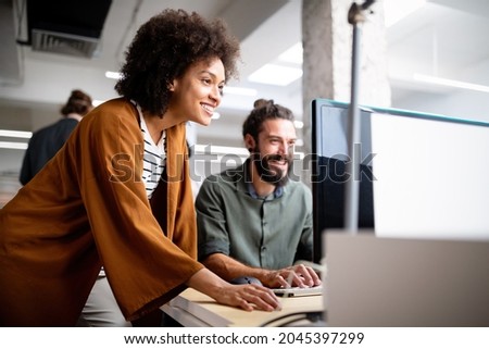 Creative managers crew working with new startup project in office. Team brainstorming. Royalty-Free Stock Photo #2045397299