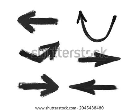 hand drawn watercolor arrow black on a white background Royalty-Free Stock Photo #2045438480