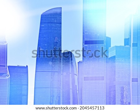 Silhouettes of business skyscrapers and modern office buildings of Moscow City against the sky with sunlight. Business and economics background