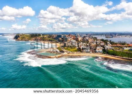 Newcaste in NSW of Australia - Pacific coast waterfront at Hunter river mouth. Aerial scenic landscape. Royalty-Free Stock Photo #2045469356