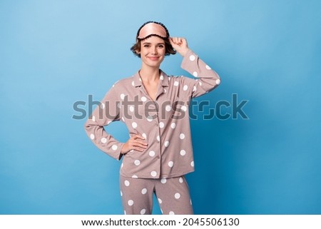 Photo of young attractive charming lovely pretty sweet nice girl with eye mask prepare to sleep isolated on blue color background Royalty-Free Stock Photo #2045506130
