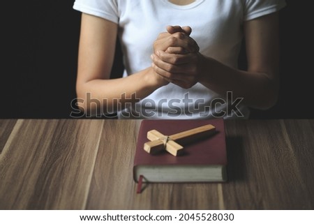 woman hands praying to god with the bible. Woman Pray for god blessing. Religious beliefs Christian life crisis prayer to god.