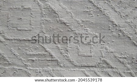 This is a white background cloth with beautiful texture and shape which is made of white threads and due to which it looks very beautiful.