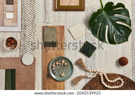 Flat lay design of creative architect moodboard composition with samples of building, beige textile and natural materials and personal accessories. Top view, template.