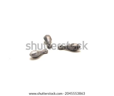Three silver bank sinkers fishing accessories isolated on white background. Half ounce fishing terminal tackle weight to keep your bait and lure at an effective depth for ground, bottom fishing Royalty-Free Stock Photo #2045553863