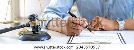 Attorney or Judge gavel with Justice lawyers sign contract , Business man  or lawyer working on a documents. Legal law and is consulting and legal advice, advice and justice concept.