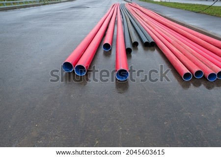 Flexible plastic pipes for laying electric high-voltage cable.