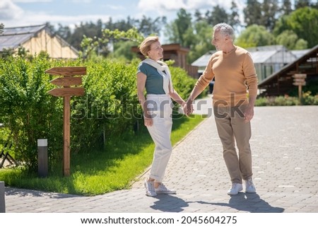 Romantic couple enjoying each other society during the morning walk
