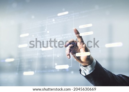 Multi exposure of businessman hand clicks on abstract graphic coding sketch on blurred office background, big data and networking concept