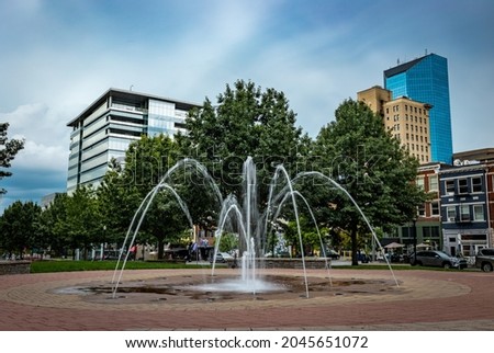 Lexington, Kentucky downtown fountain with financial business district of the city visible in a distance Royalty-Free Stock Photo #2045651072