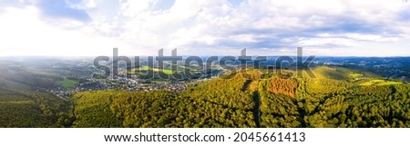 the landscape of the siegerland with the city siegen in the background panorama Royalty-Free Stock Photo #2045661413
